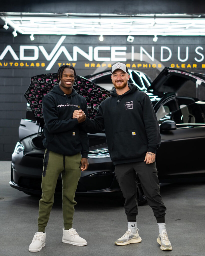 Heisman Trophy winner from Colorado Travis Hunter with Advance Industries Owner Cameron Saheb
