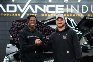 Heisman Trophy winner from Colorado Travis Hunter with Advance Industries Owner Cameron Saheb
